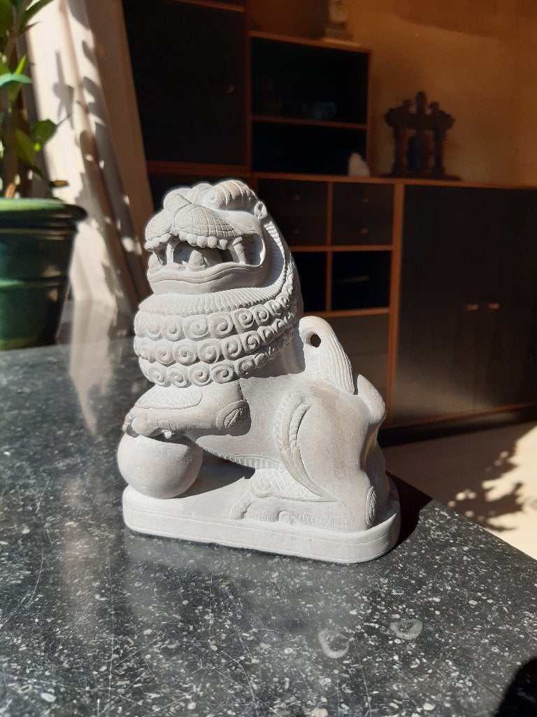 Lion de temple chinois en pierre, Enlèvement
