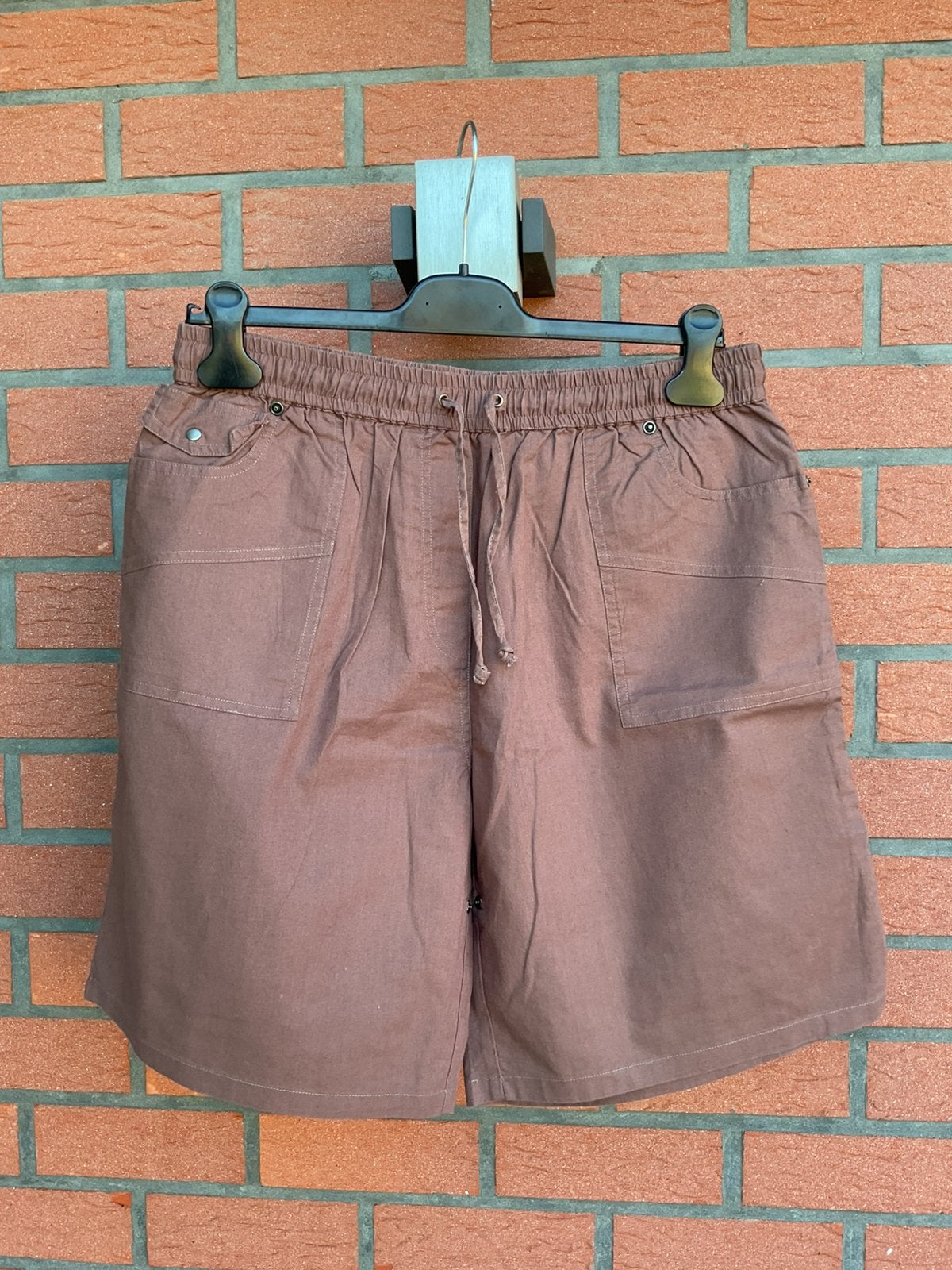 Bruin damesshort met elastische taille Maat 48 zie foto, Ophalen of Verzenden, Gedragen, Maat 46/48 (XL) of groter, Bruin