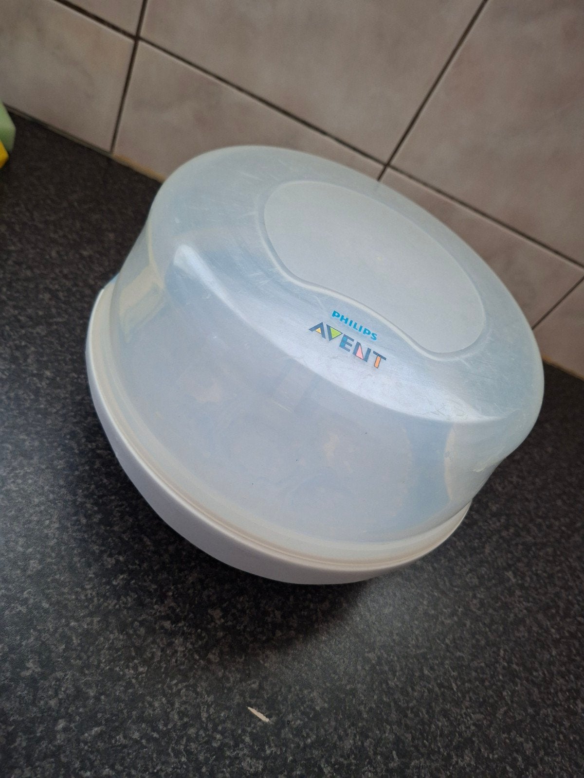 Avent flessuitkoker en verdeelpotjes, Ophalen