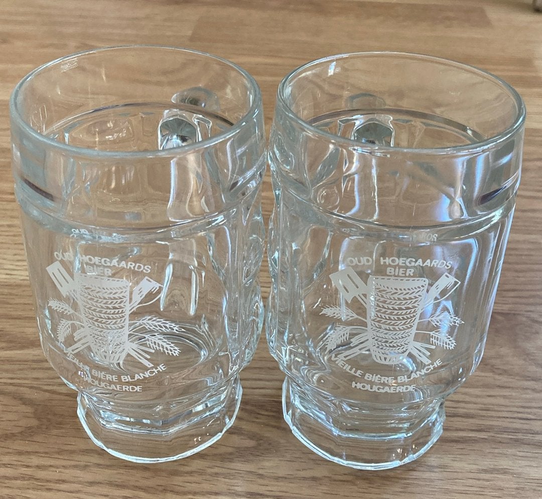 2 Bierglazen met handvat Hoegaarden, Ophalen of Verzenden, Zo goed als nieuw, Glas of Glazen, Overige merken