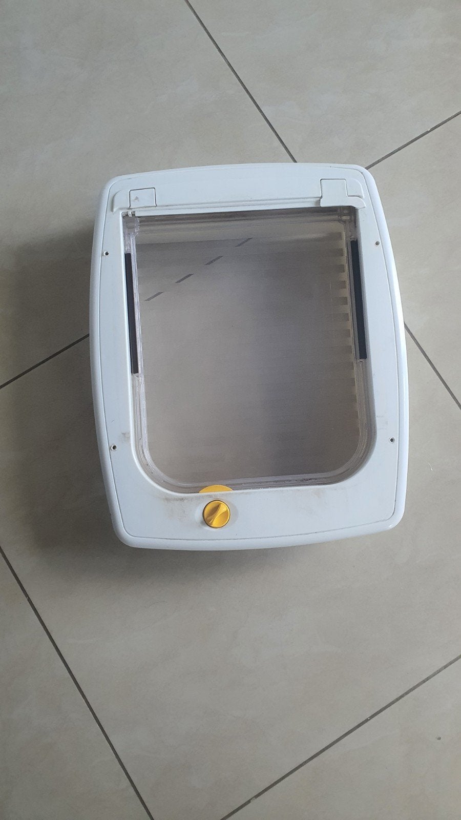 poortje voor kleine huisdieren, Ophalen