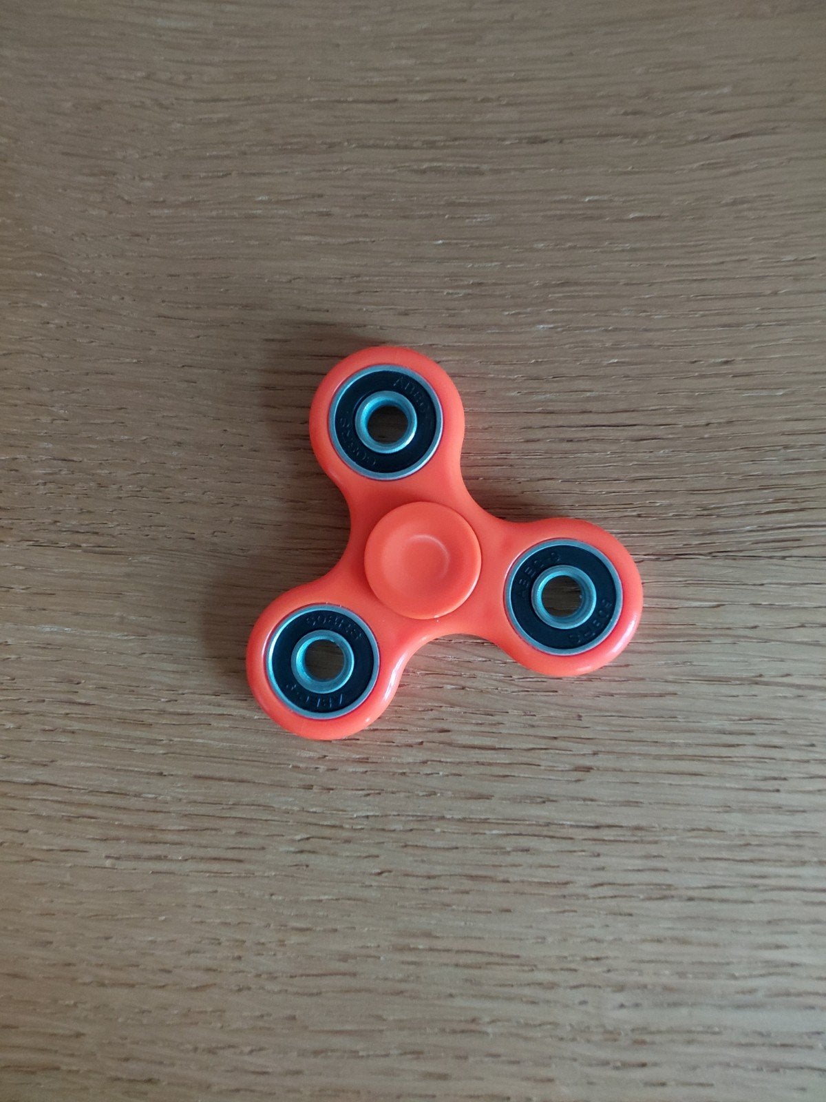 orange fidget spinner, Ophalen of Verzenden, Gebruikt