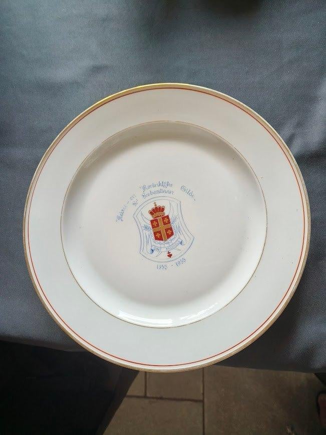 Servies Handbooggilde Sint Michiels, Ophalen