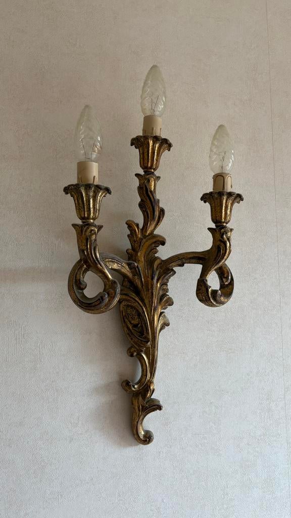 Set wandkandelaars, Ophalen