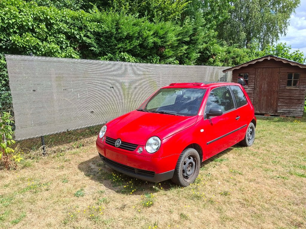 Volkswagen Lupo 1.4 MPI Sunshine, Autos, Rouge, Boîte manuelle, 146 g/km, 1009 kg