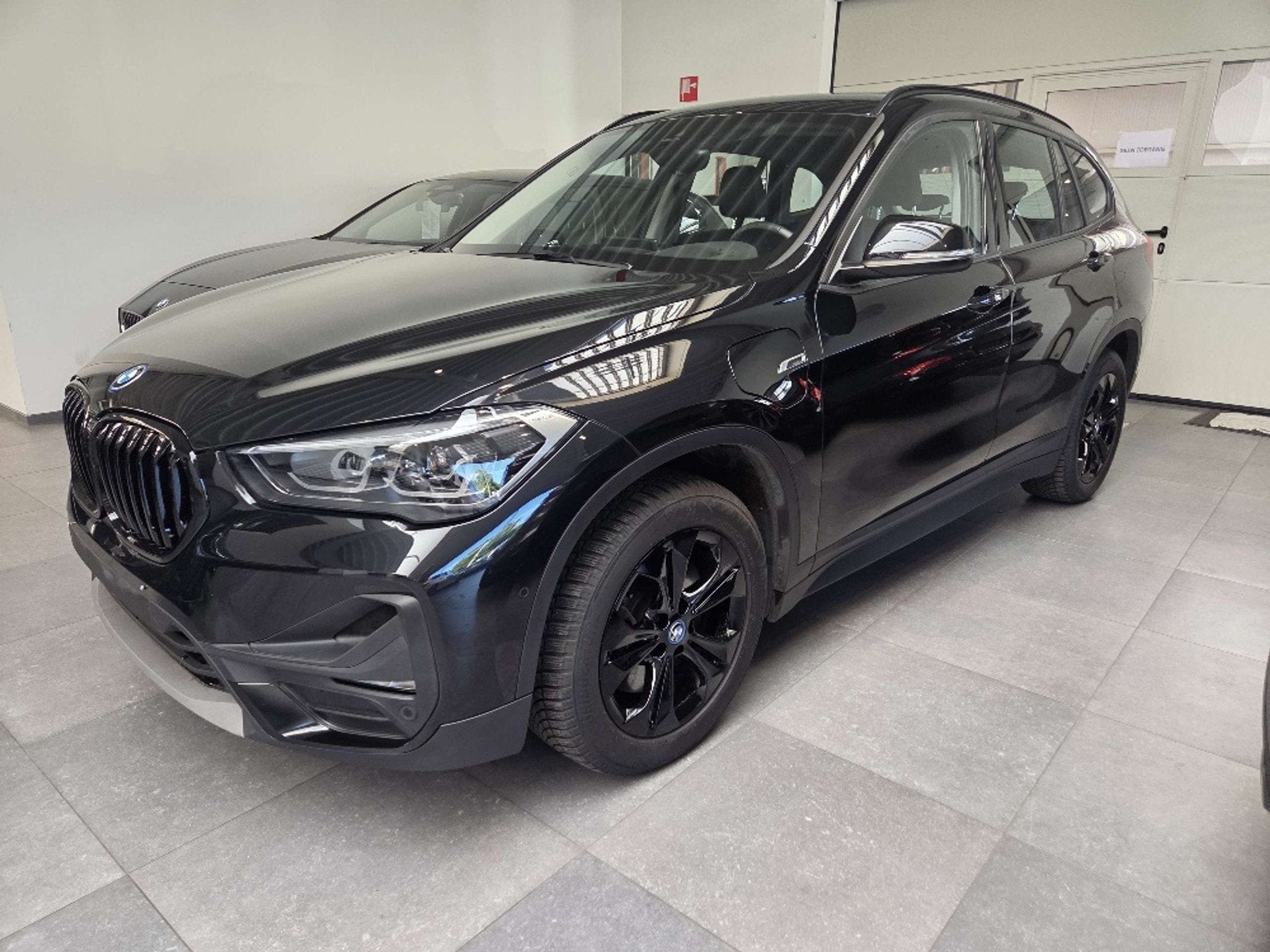 BMW X1 X1 PHEV 1.5iA xDrive25e OPF, Auto's, Gebruikt, Zwart, Leder, Bedrijf