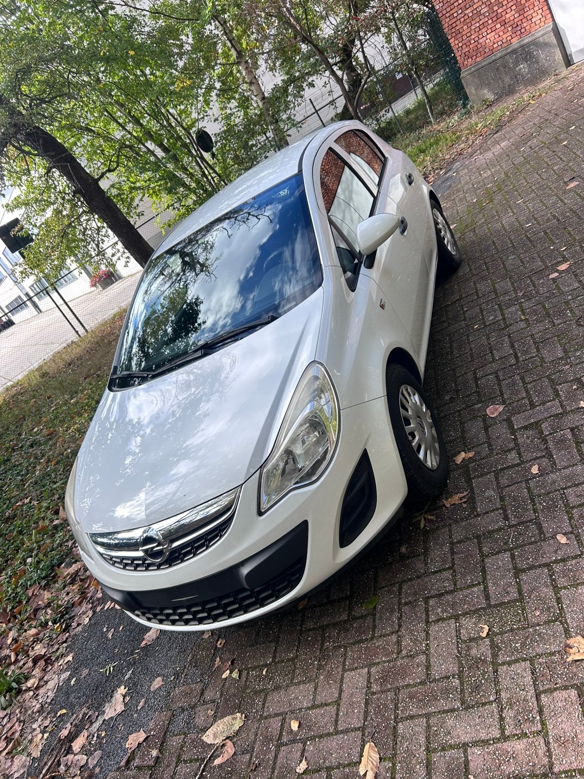 Opel Corsa 1,2 i Euro 5 benzine 2013, Auto's, Voorwielaandrijving, Euro 5, Stof, 4 cilinders