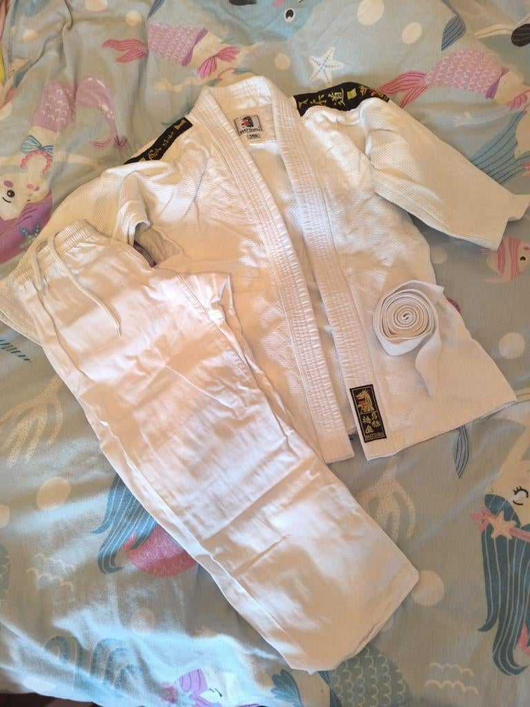 Karate pak maat 140, Ophalen