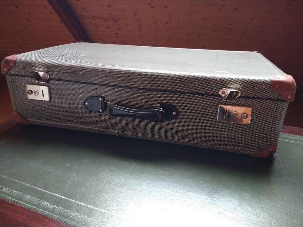 Klassieke vintage reiskoffer, Ophalen