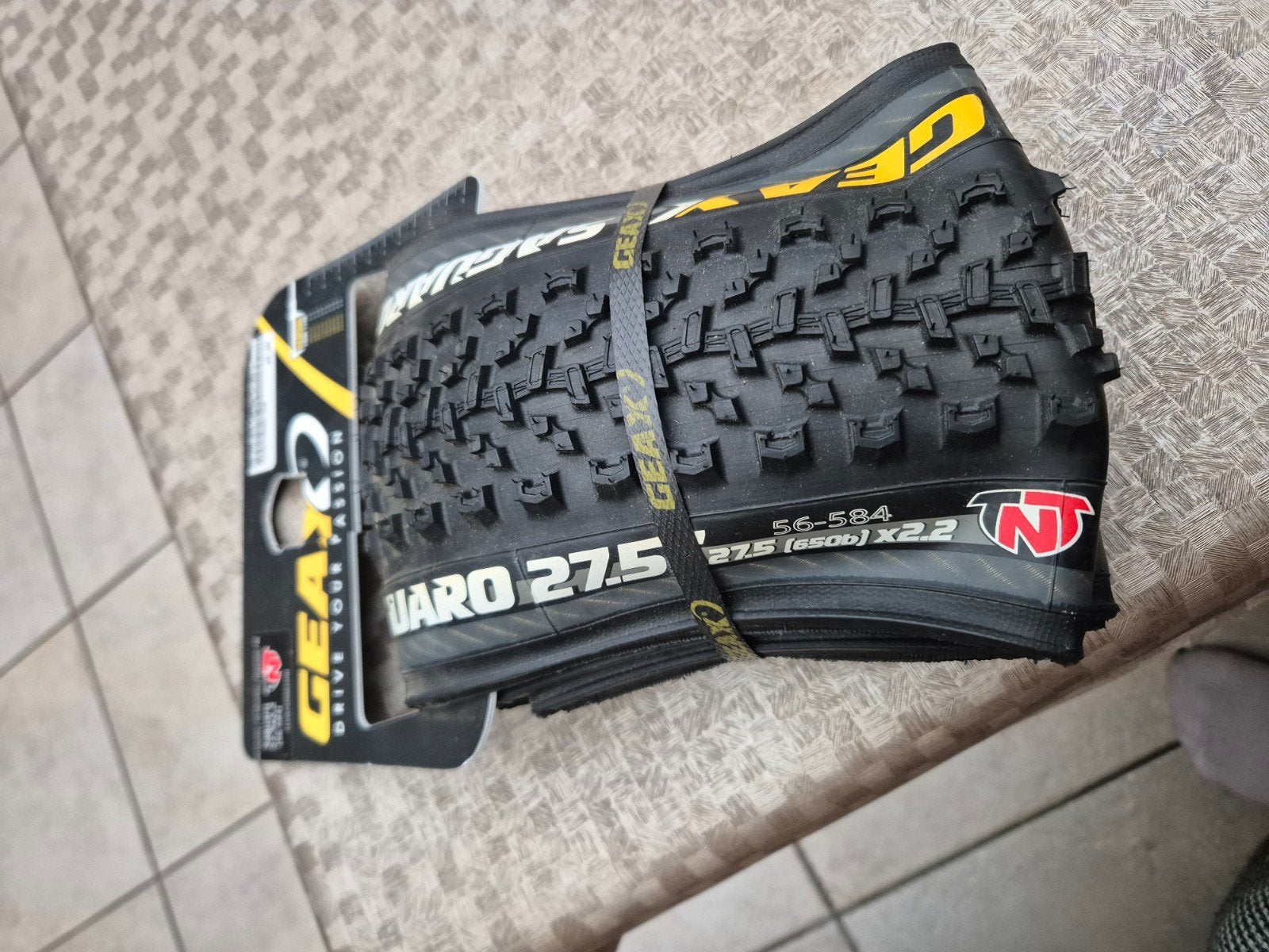 Nieuwe fietsband 27.52.2 TNT - verkeerd gekocht, Fietsen en Brommers, Ophalen of Verzenden, Stuur