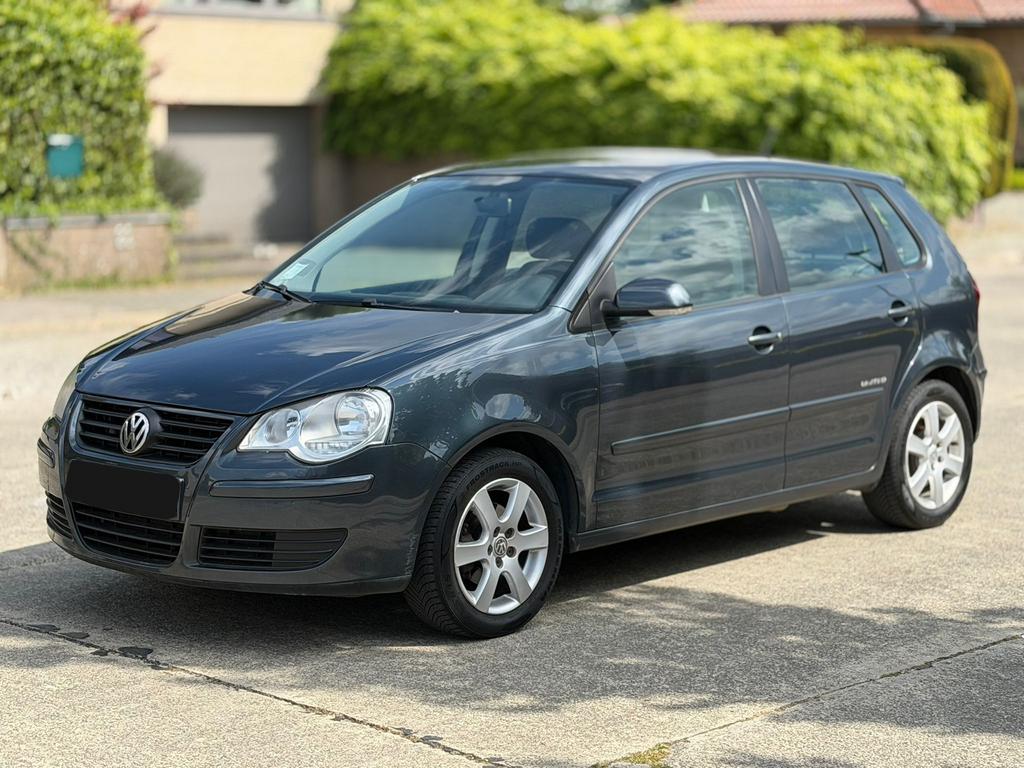 VOLKSWAGEN POLO 1.2 • NIEUWE DISTRIBUTK • BLANCO GEKEURD VVK, Stof, Zwart, 4 cilinders, 5 deurs