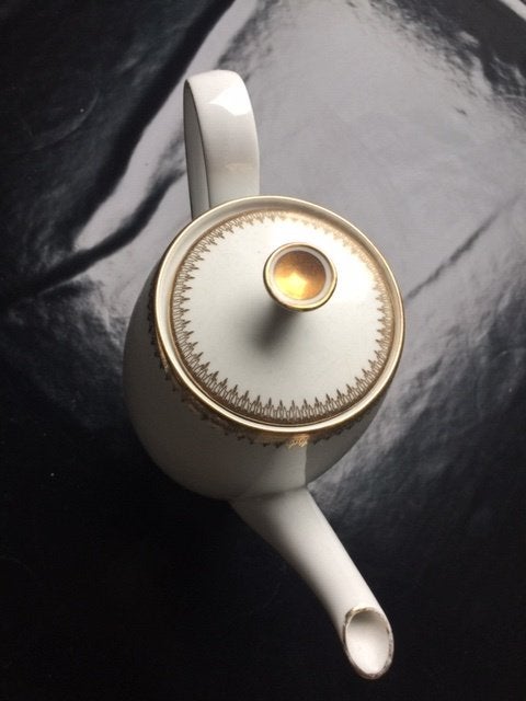 Ancienne cafetière en porcelaine, Enlèvement