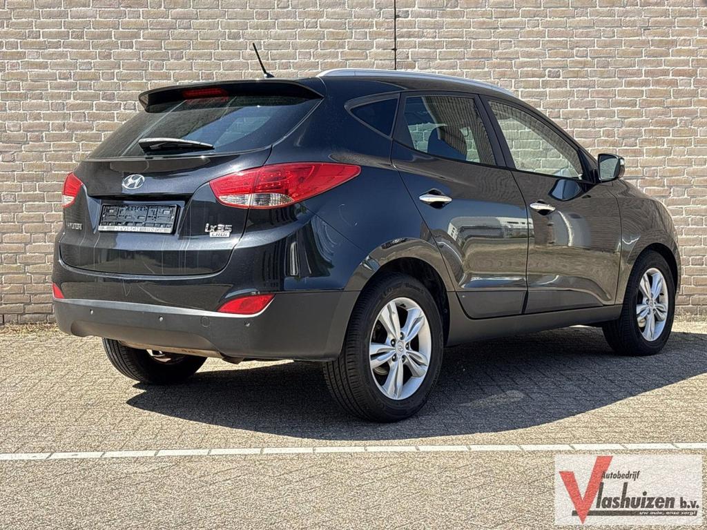 Hyundai ix35 1.7 CRDi Comfort | Cruise | Climate | Leder | S, Auto's, Hyundai, 135 g/km, Zwart, SUV of Terreinwagen, IX35