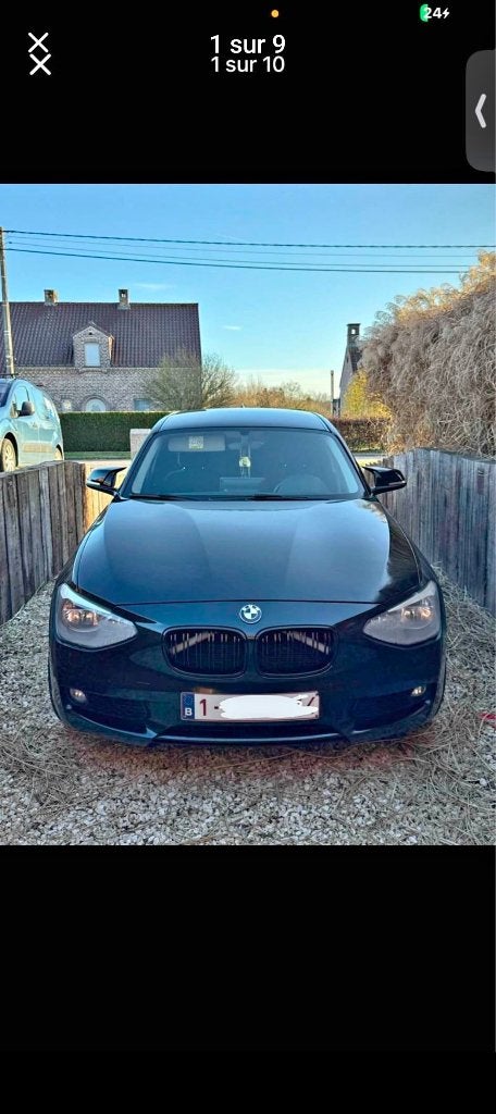 BMW 1-serie F20 114i uit 2013, Auto's, BMW, 4 deurs, 1 Reeks, Zwart, Zwart