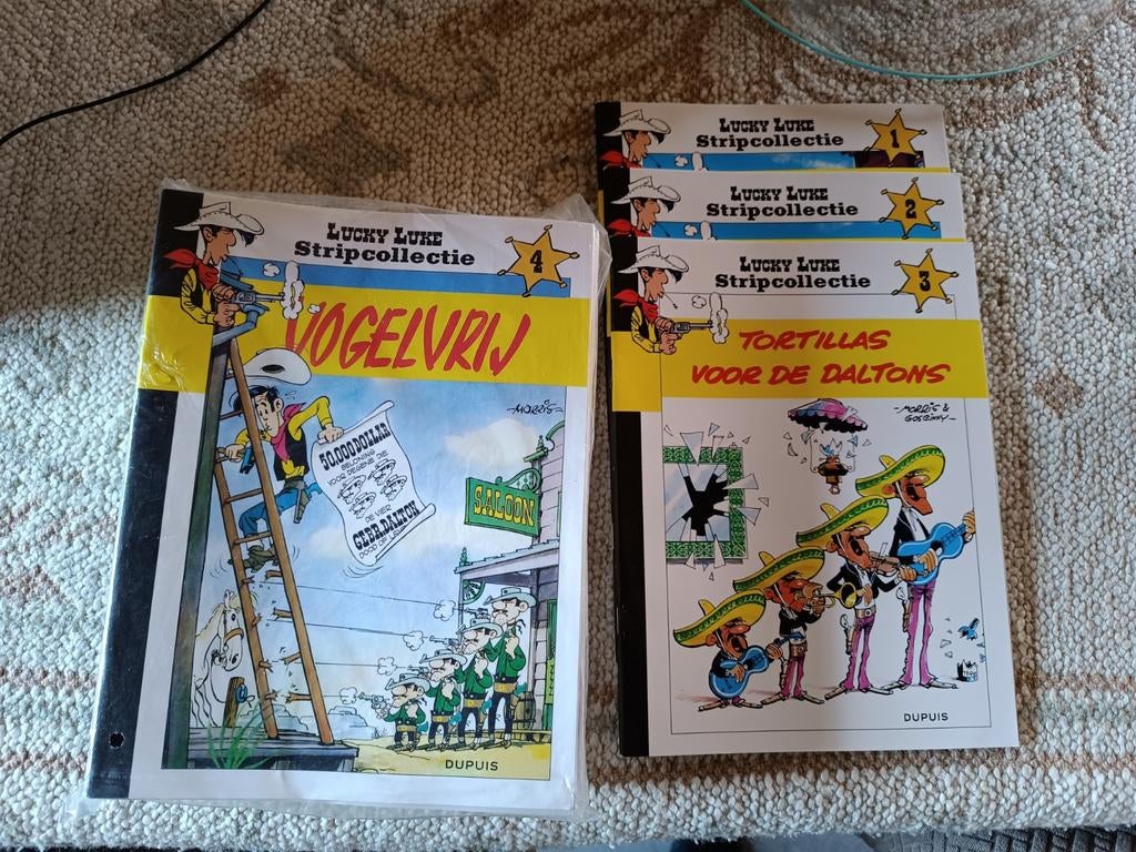 Lucky Luke Stripcollectie : 24 strips HLN, Ophalen of Verzenden