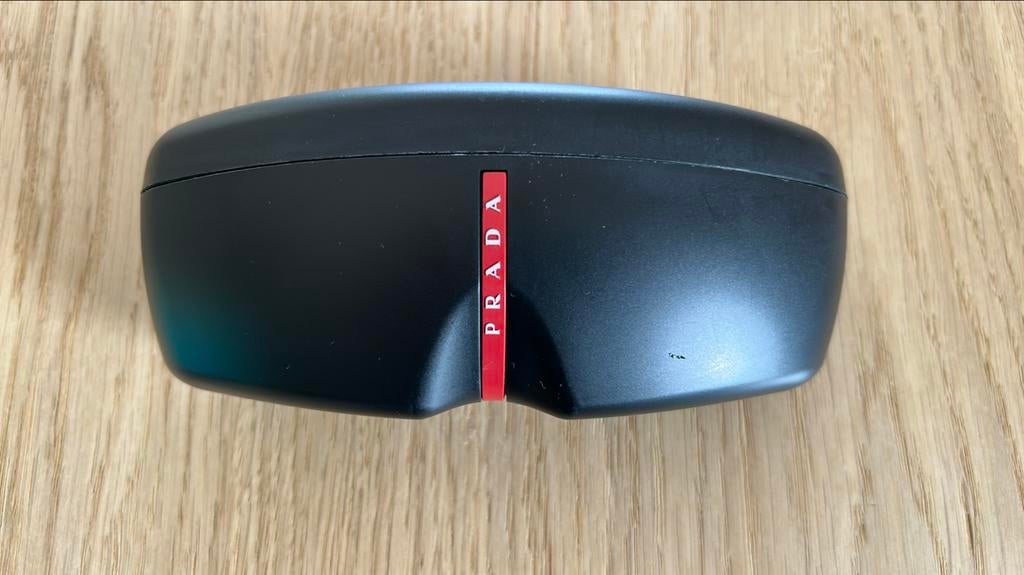 Lunettes de soleil Prada polarisées noires, Autres marques, Enlèvement ou Envoi, Utilisé, Lunettes de soleil