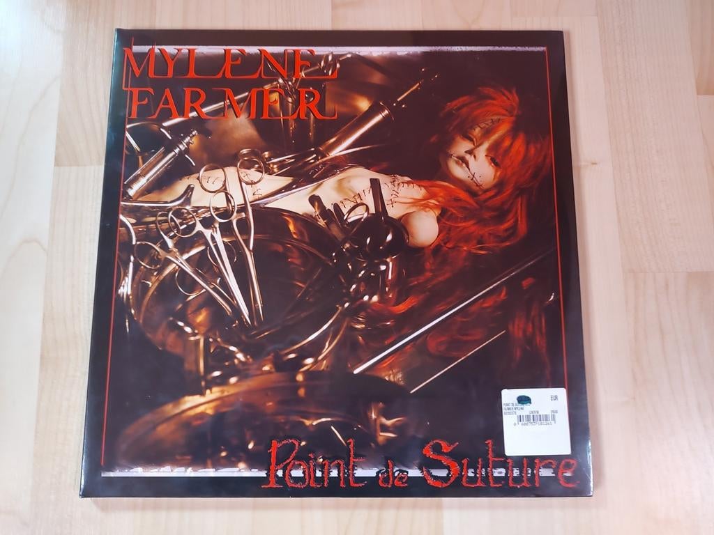 Mylène Farmer - Point de suture (album vinyle), Enlèvement, Comme neuf