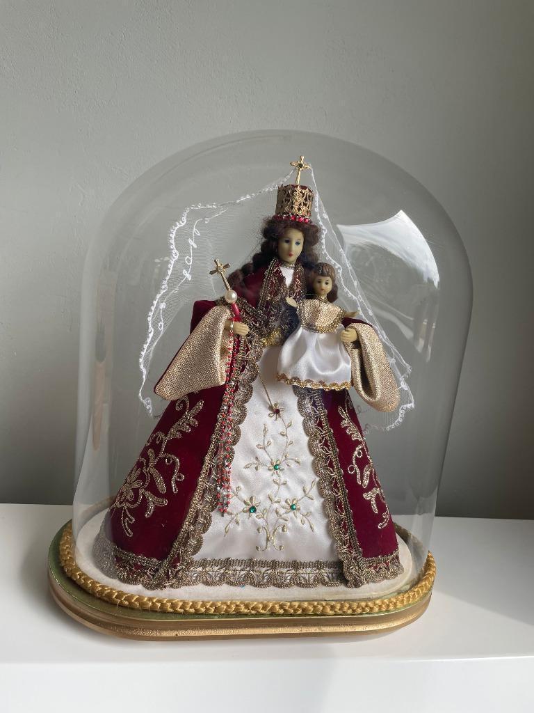 Globe en verre avec vierge, Ophalen