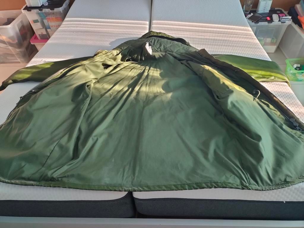 Veste militaire de pluie, Neuf