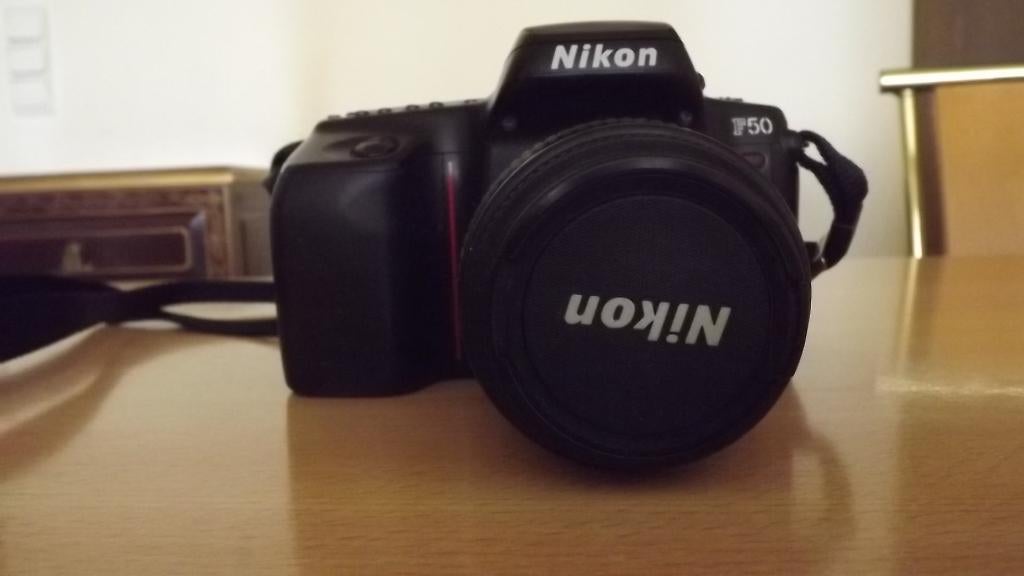 Nikon F50 met zoomlens AF Nikkor 35-80mm +filmrol, Ophalen of Verzenden, Zo goed als nieuw, Spiegelreflex, Nikon