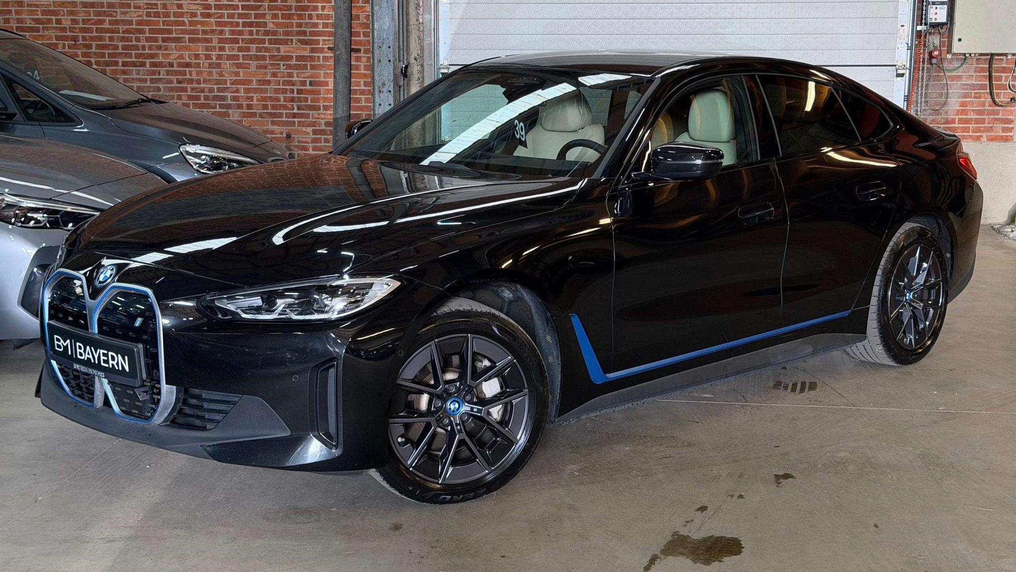BMW i4 Gran Coupe eDrive35 Garantie Automaat, Auto's, BMW, Gebruikt, Beige, Zwart, Leder