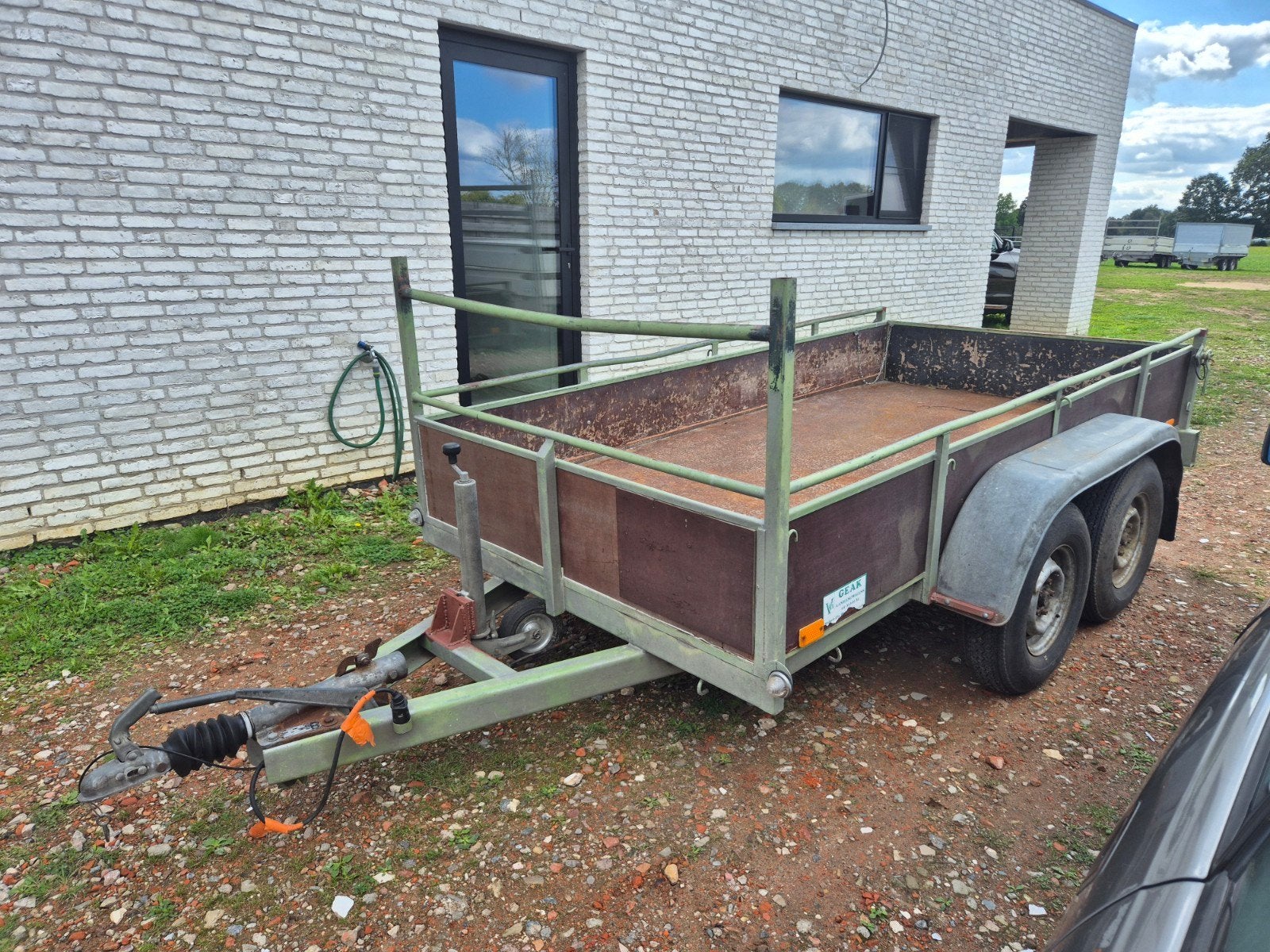 Geremde dubbelasser met papieren, Auto diversen, Ophalen