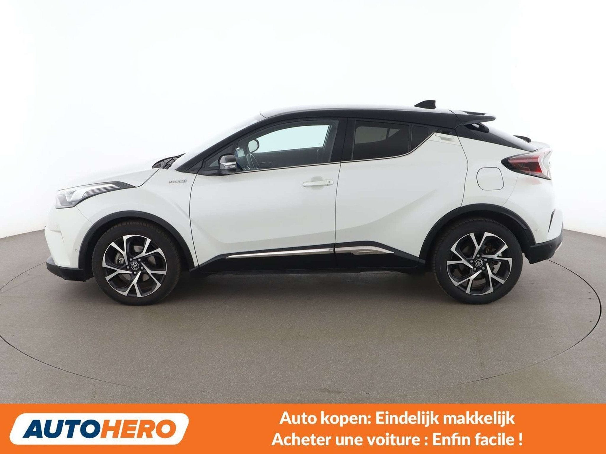 Toyota C-HR 1.8 Hybrid Distinctive (bj 2021, automaat), Auto's, 122 pk, Gebruikt, 86 g/km, Wit