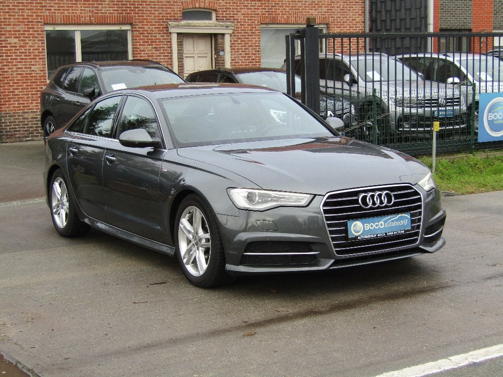 Audi A6 2.0 TDI Automaat S-Line, Auto's, 4 deurs, 4 cilinders, Leder, Bedrijf