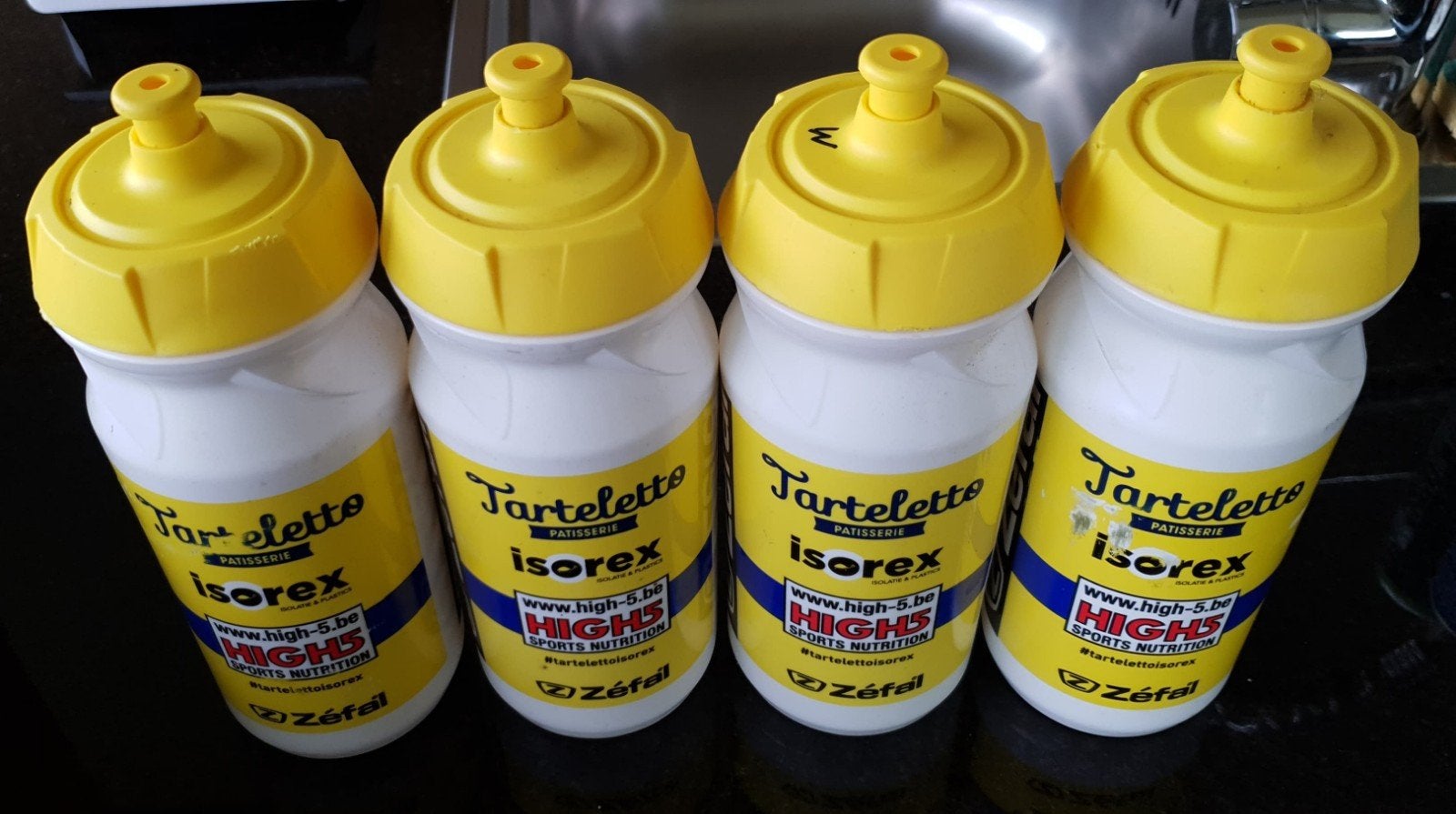 Lot van 34 koersbidons o.a. UAE, Lotto, Jumbo, Movistar, Ophalen of Verzenden, Gebruikt, Overige typen