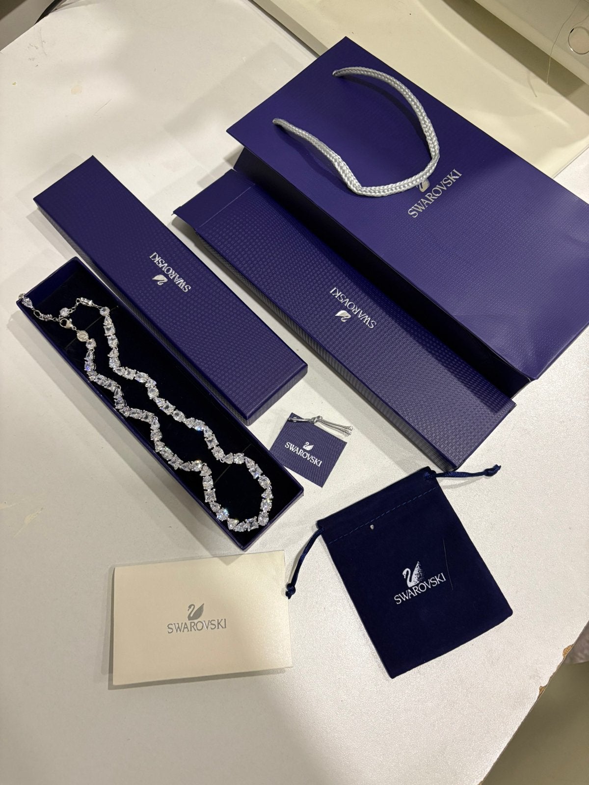 Swarovski Mesmera ketting luxe wit slijpvorm zirkonia toebe., Handtassen en Accessoires, Ophalen of Verzenden, Zo goed als nieuw