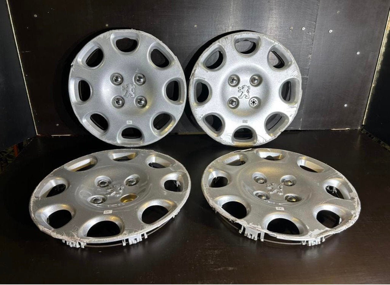 Promo 4 originele Peugeot 206.207 partner 14" wieldoppen, Ophalen of Verzenden, Gebruikt