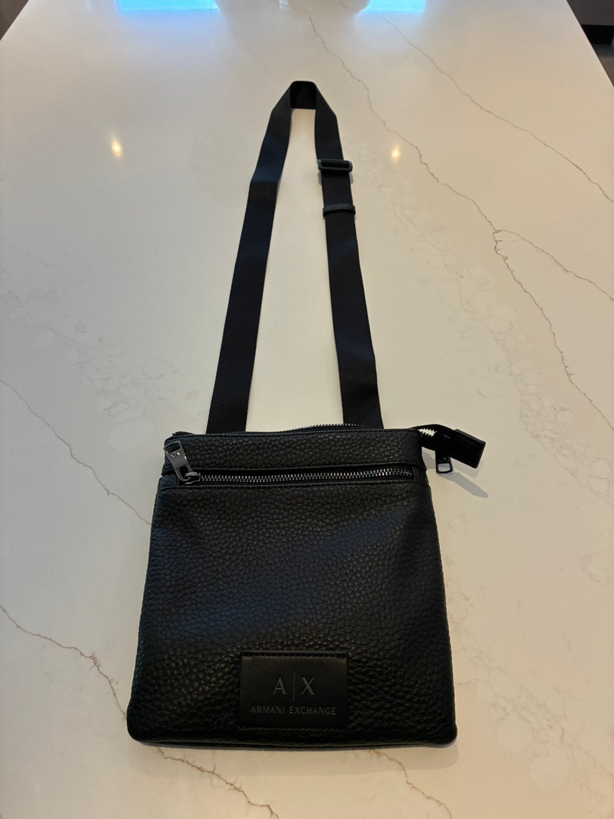 Armani tas, Motoren, Ophalen, Zo goed als nieuw