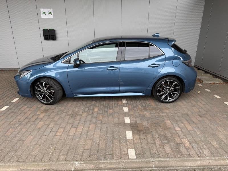 Toyota Corolla 5d Premium, Auto's, Automaat, https://public.car-pass.be/vhr/f0242521-b63b-4b20-8eb5-c4e8bd4c23dc, 72 kW, Blauw