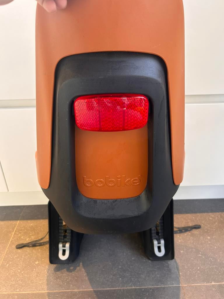 Bobike fietsstoel, Ophalen