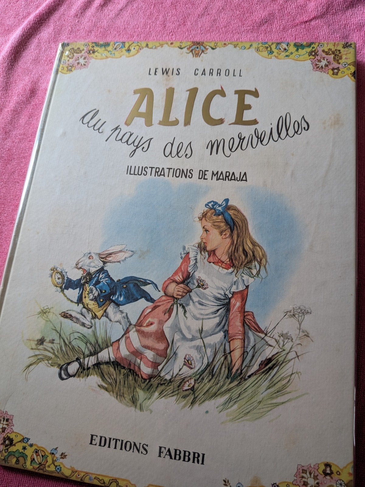 Alice au pays des merveilles - livre ancien 
Lewis Caroll, Enlèvement
