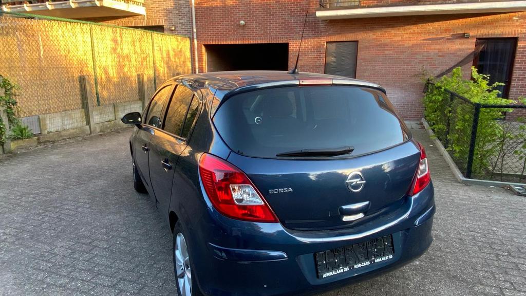 Opel corsa 1.2benzine, Auto's, Euro 5, Zwart, Blauw, Leder en Stof