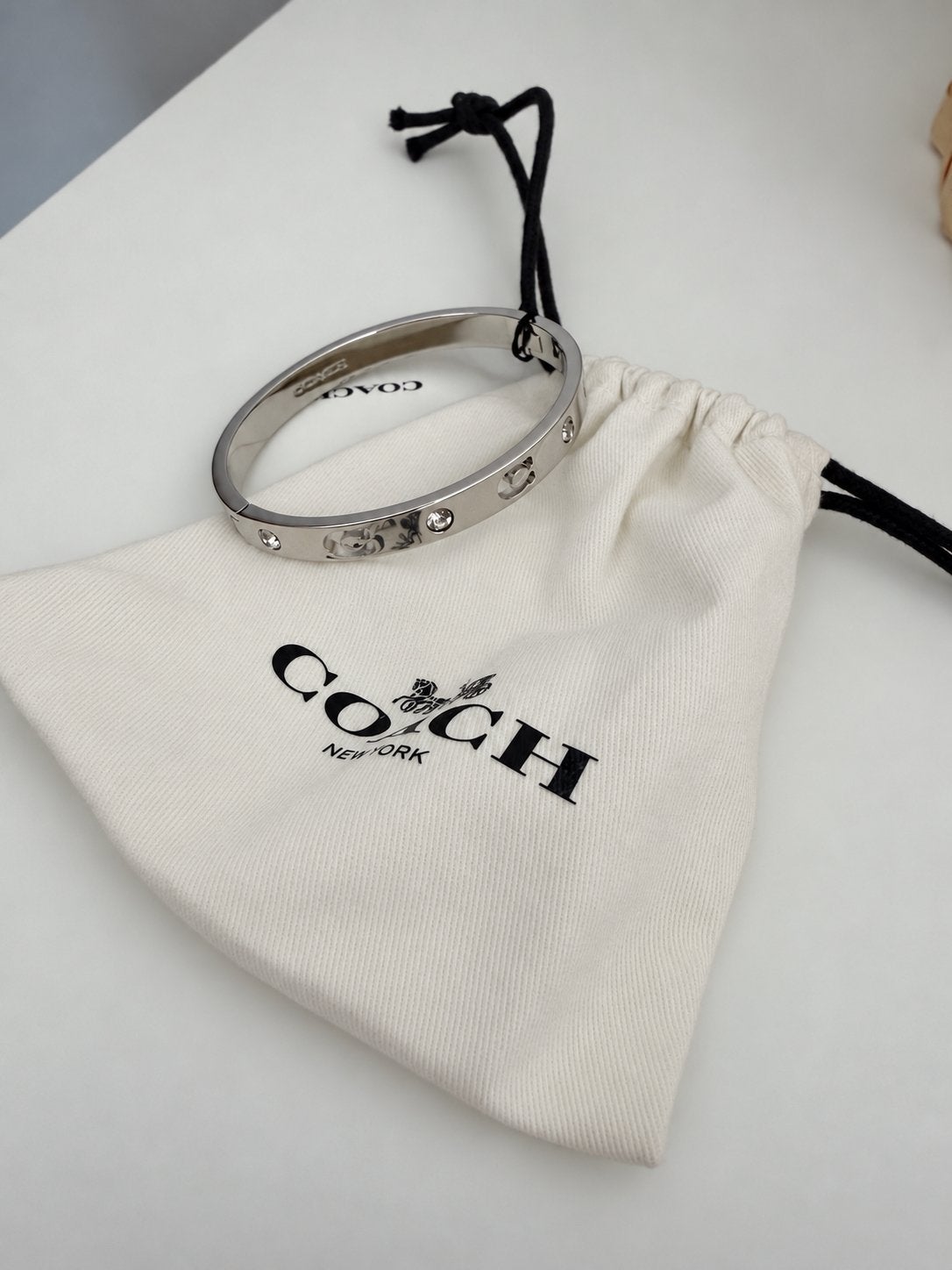 Bracelet Coach, Bijoux, Sacs & Beauté, Bracelets, Enlèvement ou Envoi, Neuf
