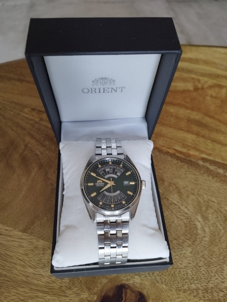 Montre ORIENT multi year calendar vert + deux bracelets, Montre-bracelet, Autres marques, Enlèvement ou Envoi, Acier