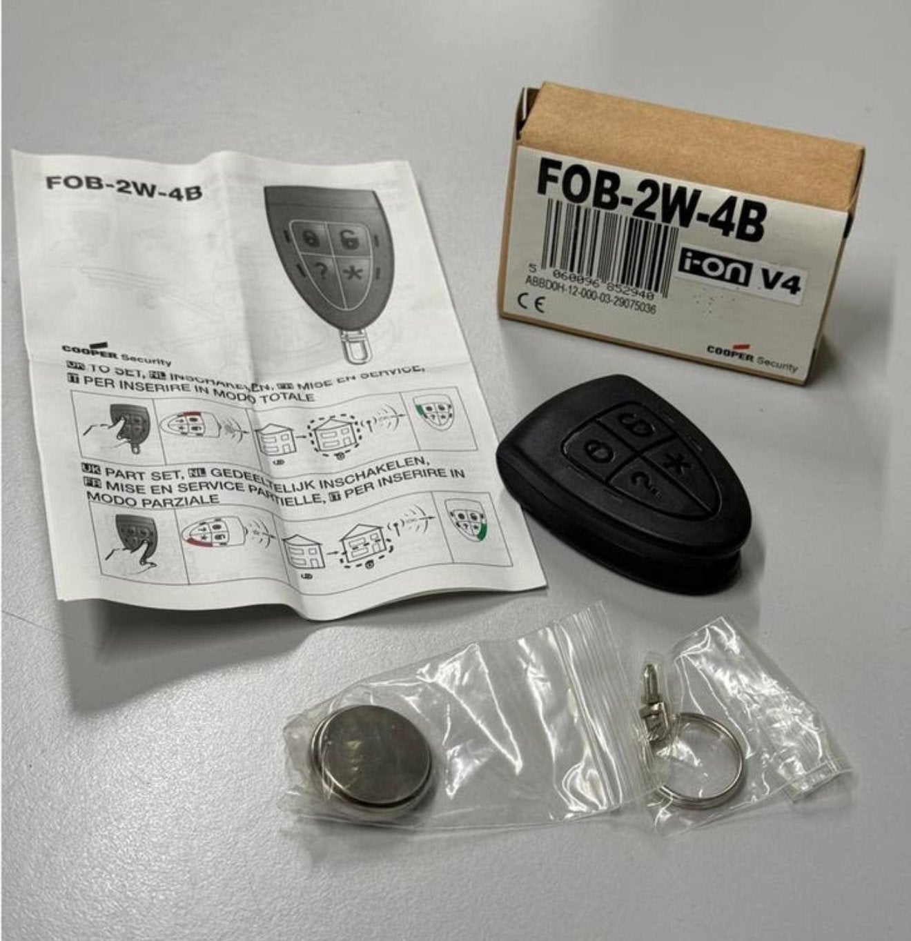 Télécommande d'alarme Cooper Security FOB-2W-4B Scantronic, TV, Hi-fi & Vidéo, Télécommandes, Enlèvement ou Envoi, Neuf, Originale