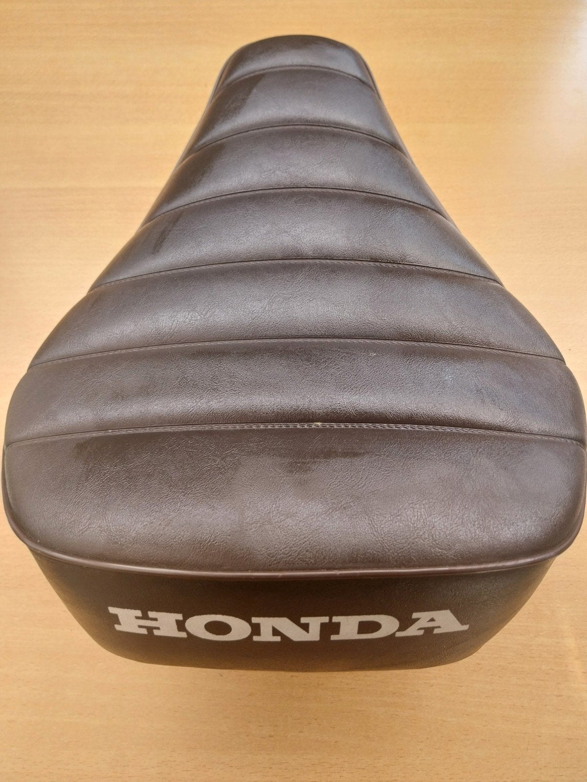 Leren zadel Honda, Ophalen, Zadel