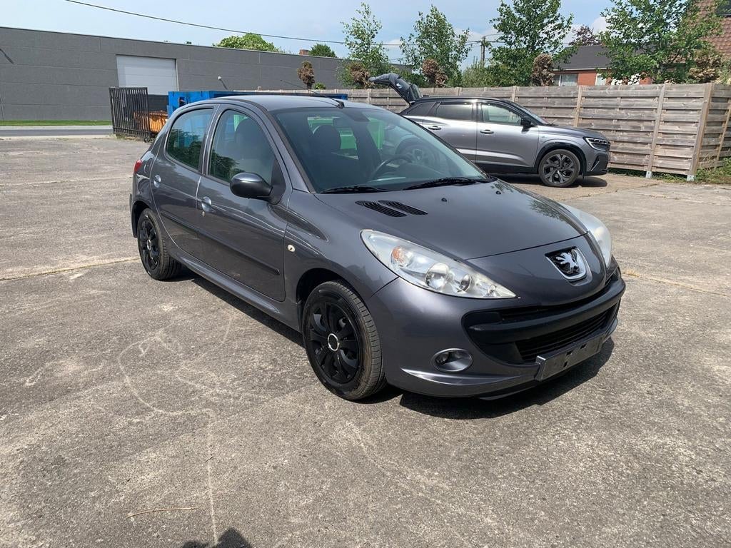 Peugeot 206+ 1.1 Benzine met 155.000km AIRCO / GARANTIE, Auto's, Voorwielaandrijving, Stof, Stadsauto, Elektrische ramen