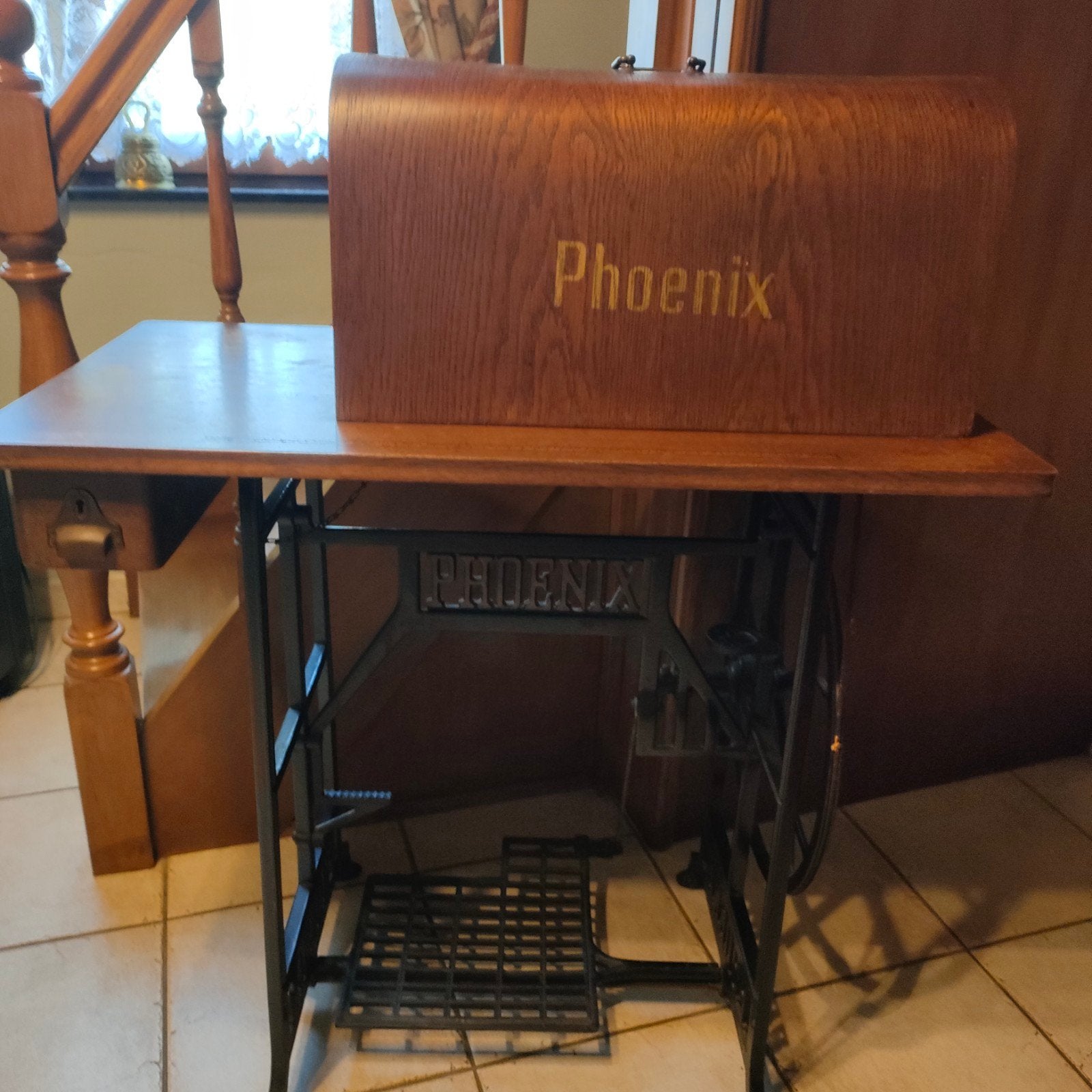Antiek naaimachine, Ophalen