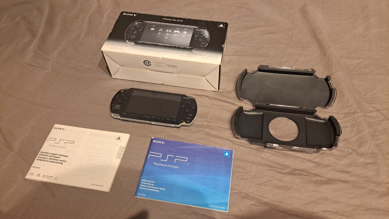 PSP jailbreakée, Comme neuf, Enlèvement, PSP, Avec jeux