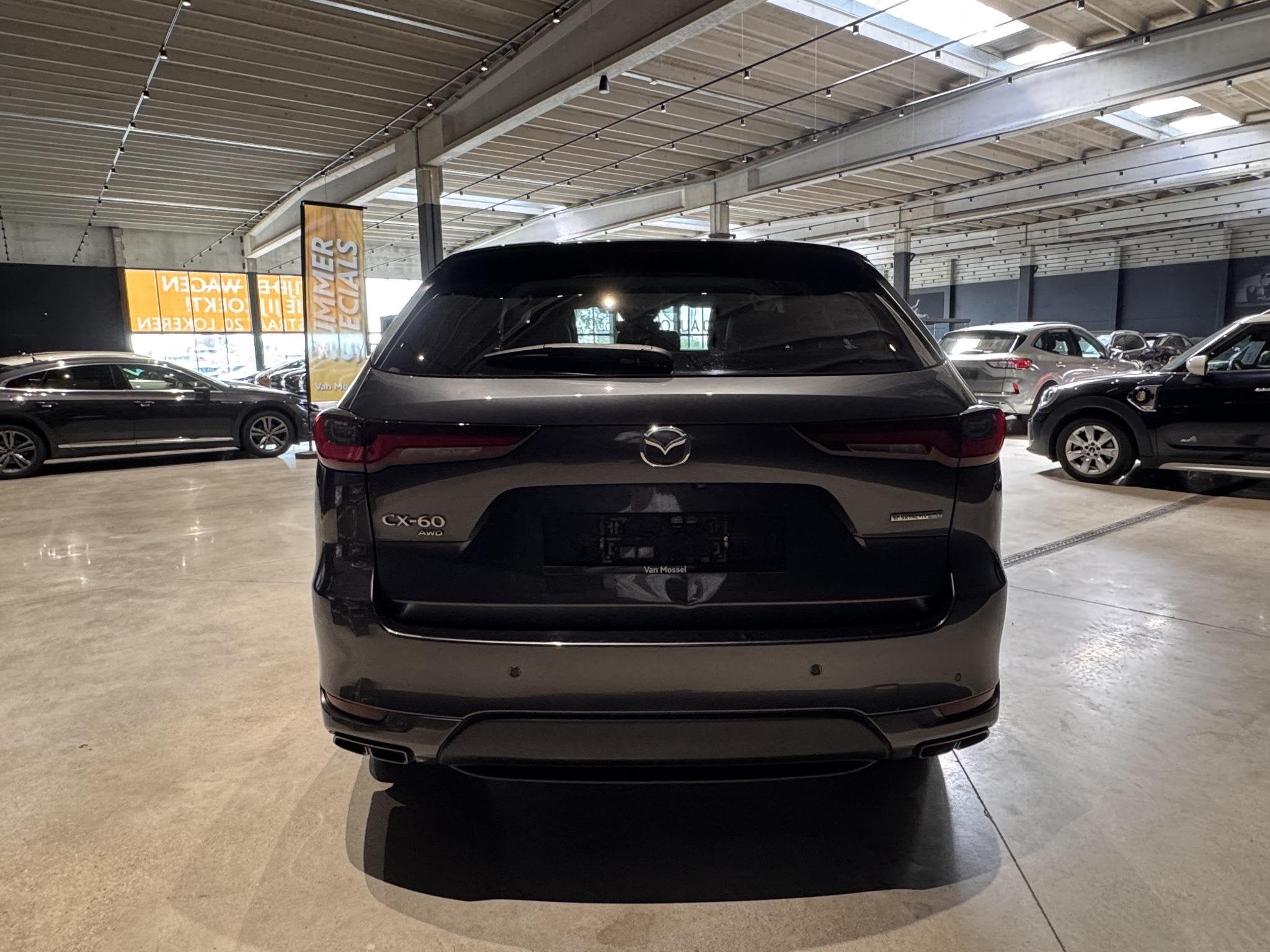 Mazda CX-60 2.5 PHEV Homura, Auto's, Automaat, Stof, Gebruikt, 2500 kg