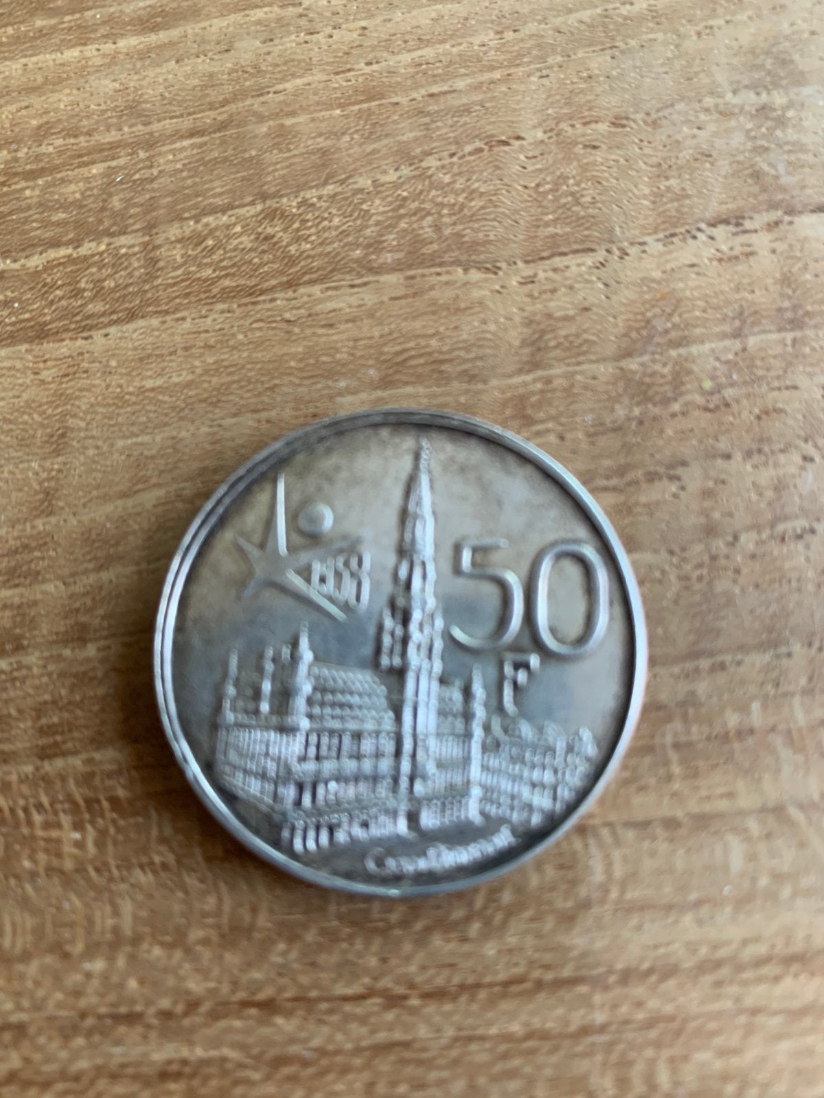 Belgische herdenkingsmunt uit 1958, Ophalen