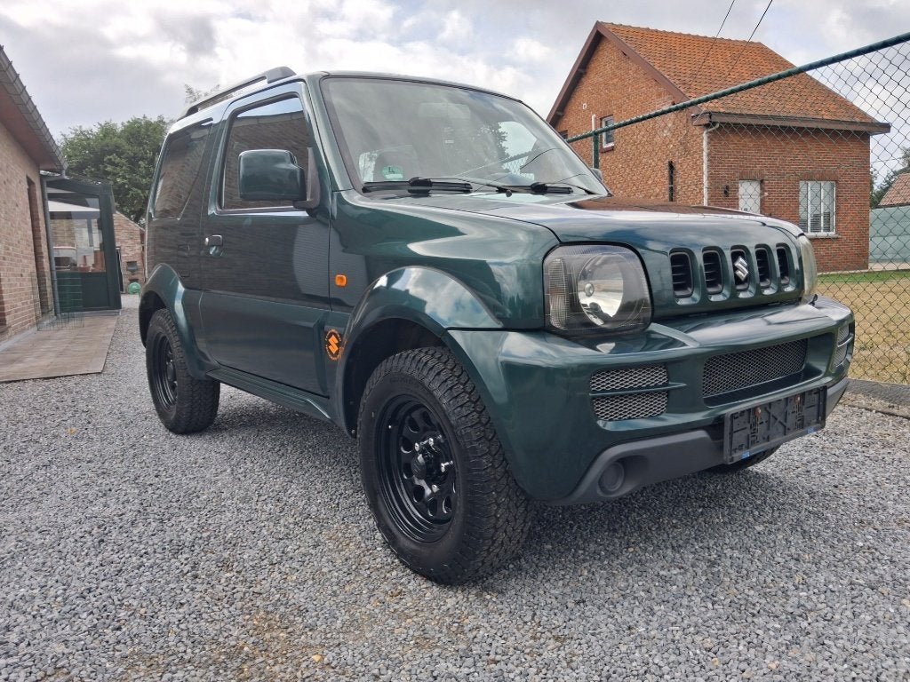 suzuki jimny #4x4# 1300cc benzine !!bj 2006!! 128 000km, Auto's, 4 zetels, Stof, Zwart, Bedrijf