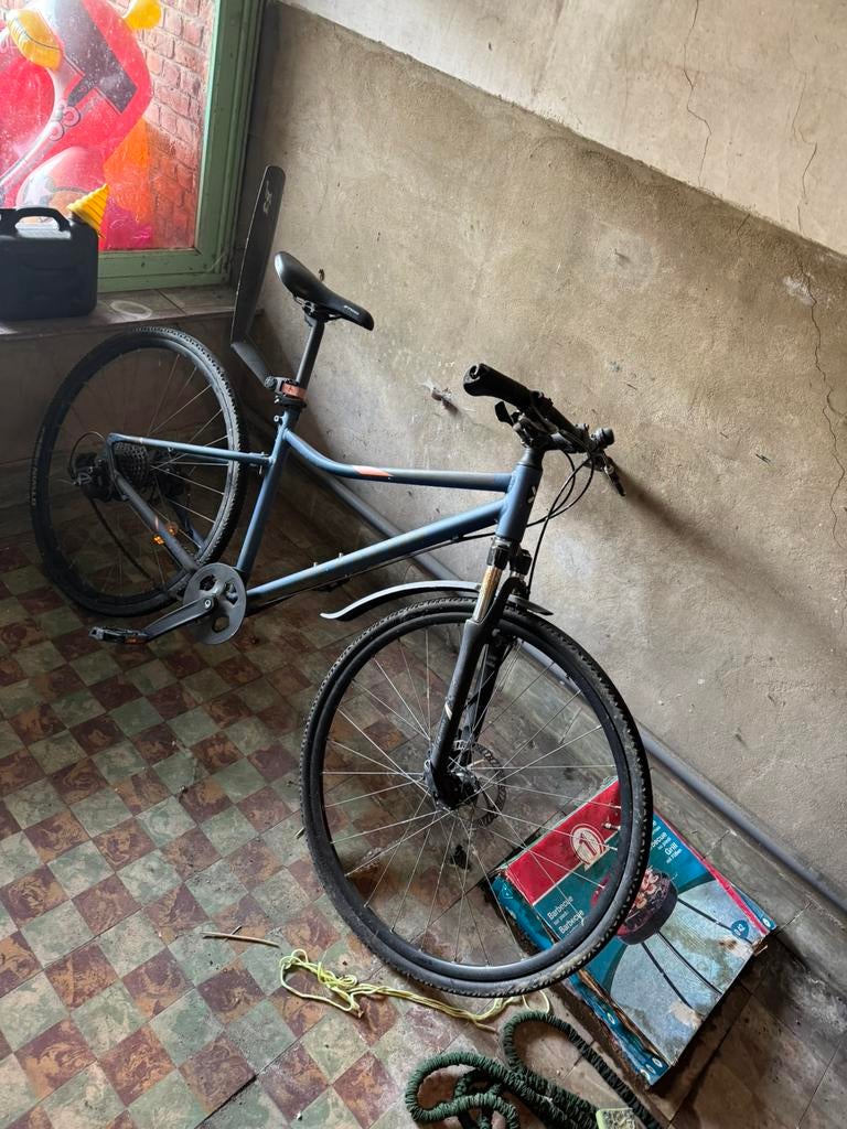 Mountainbike riverside b-twin tekoop, Ophalen