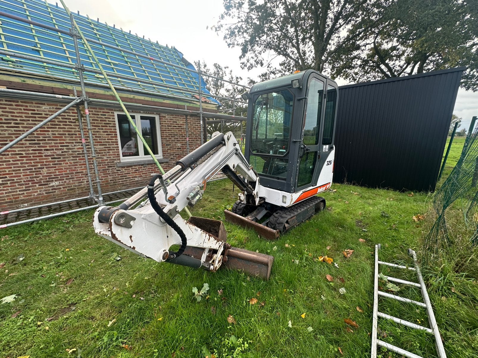 Bobcat 320 minigraver, Ophalen