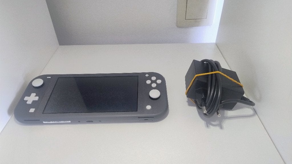 Nintendo Switch Lite, Ophalen, Grijs, Zo goed als nieuw