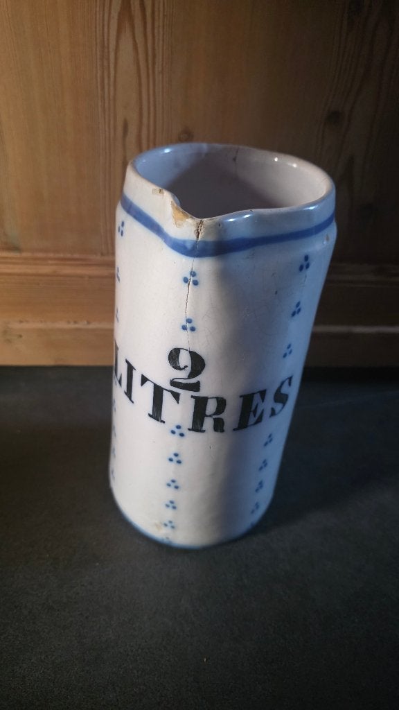 Oude aardewerk 2 liter kan, Ophalen